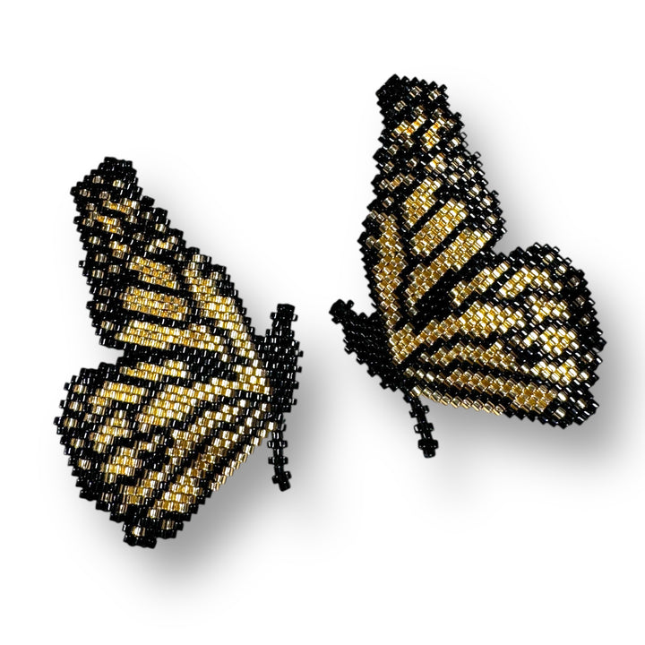 Aretes medias mariposas