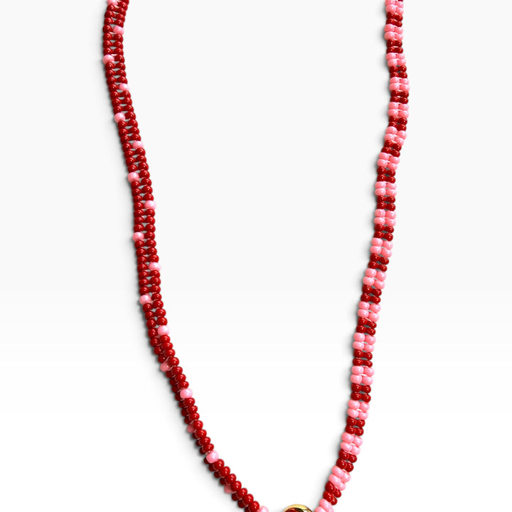 Collar gallinita rosa
