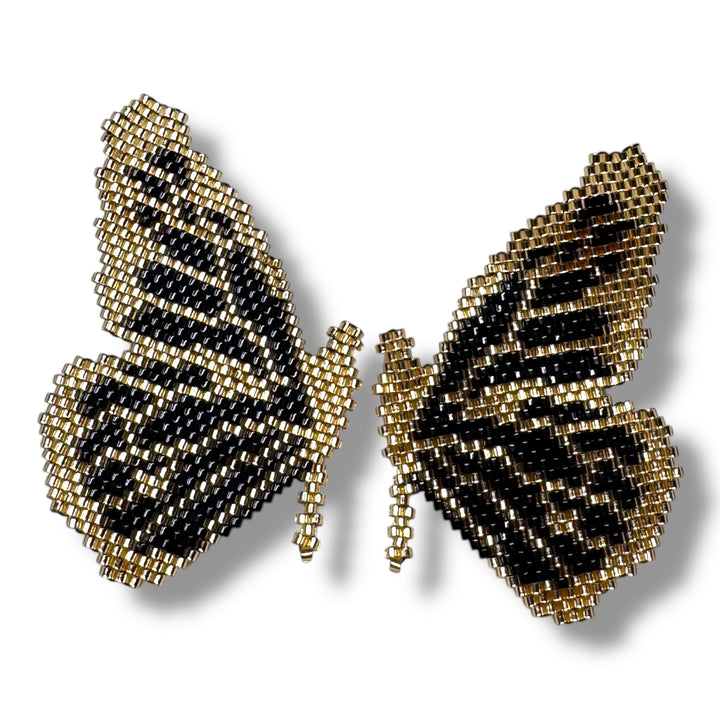 Aretes medias mariposas