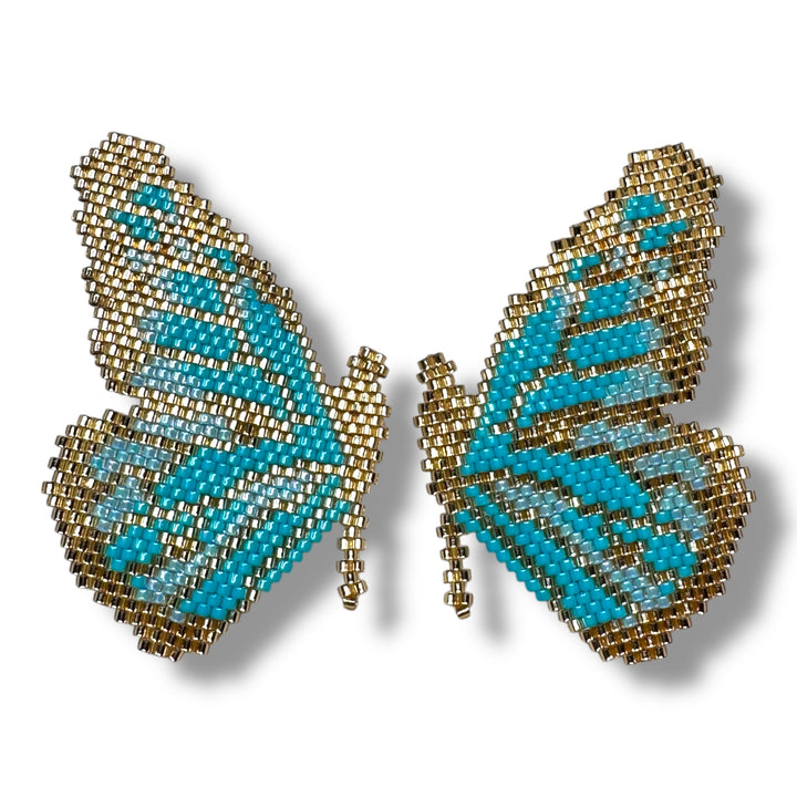 Aretes medias mariposas